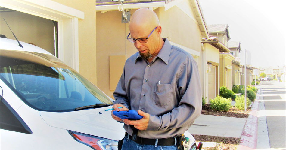 Jamie Parkins Certified Home Inspector performing an Home Inspection